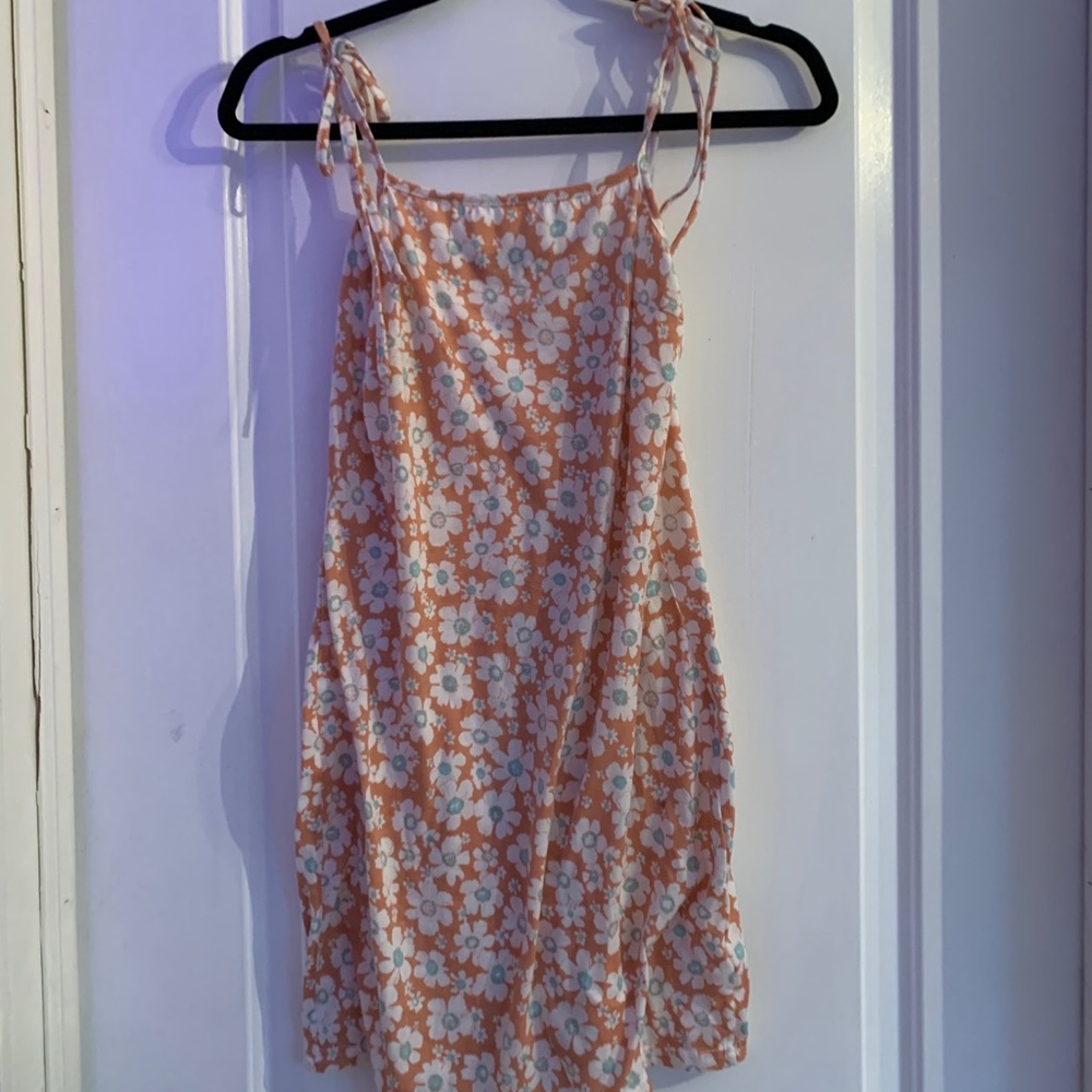 Orange dress with white flowers